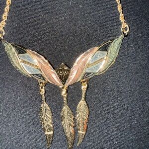 Elegant Gold and Silver Leaf Necklace